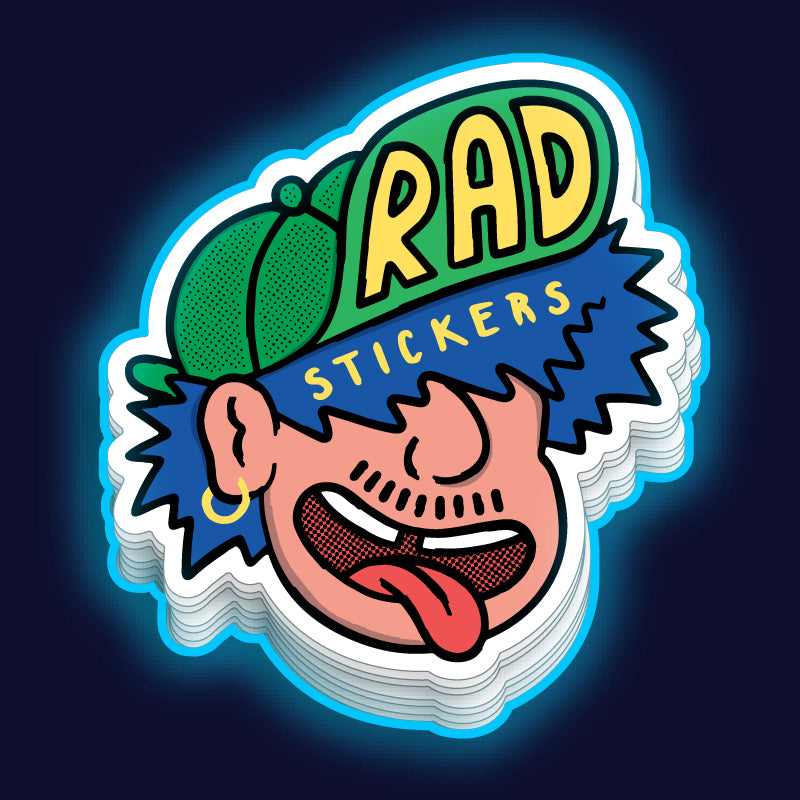 Stack of custom die-cut stickers 'Rad Stickers' with a cartoon face wearing a cap on a dark background