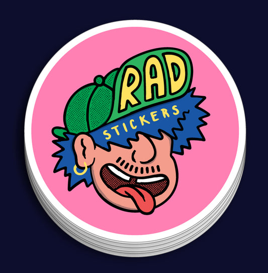 Stack of circle stickers with a colorful design featuring a face wearing a cap and sunglasses, with 'RAD STICKERS' text on a pink background.