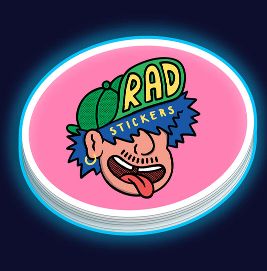 Stack of custom oval stickers with brand 'Rad Stickers' with a colourful sticker on a pink background