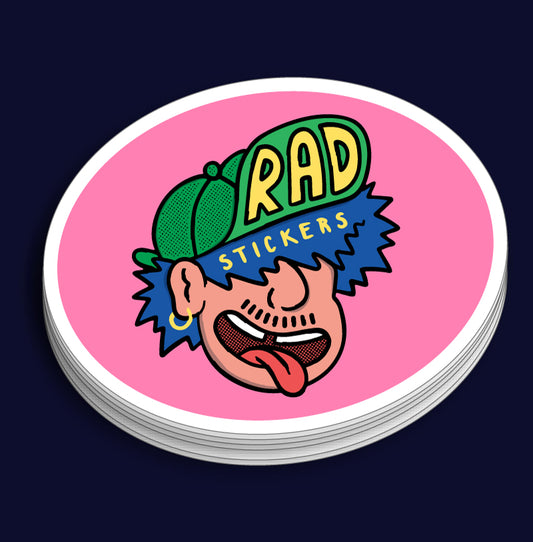 Stack of custom oval stickers with a colourful design and 'RAD STICKERS' text on a pink background